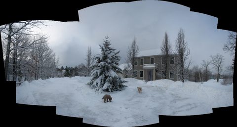 Winter panorama of the property under snow